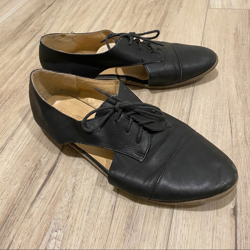 Black cut out shoes